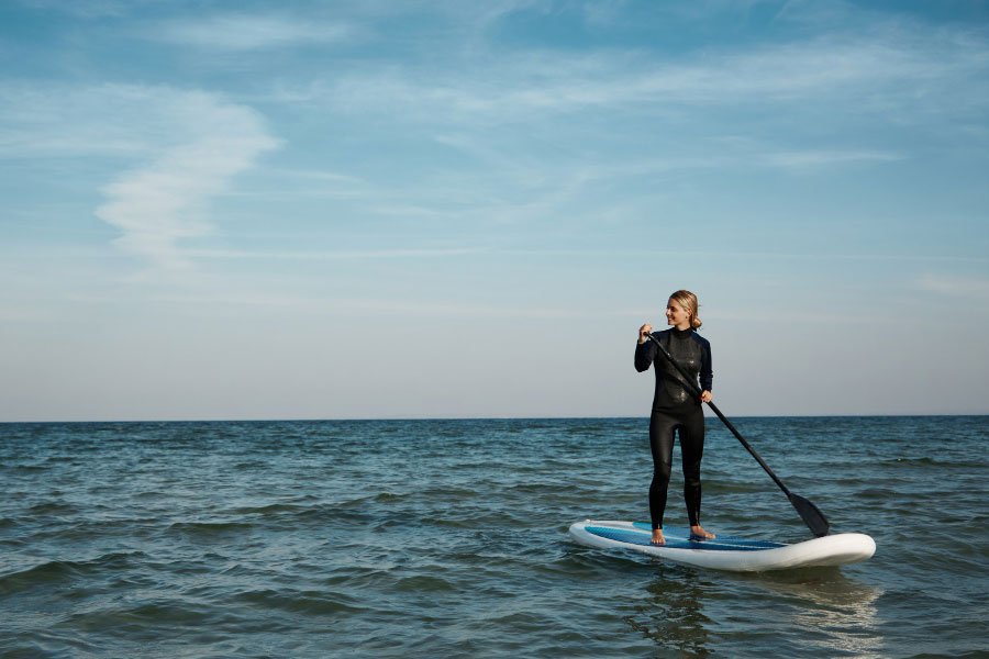 A woman on a Stand-Up Paddle Board