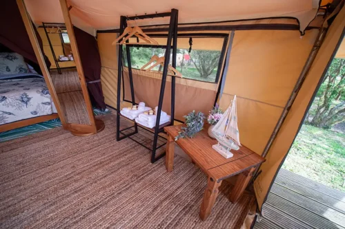 Chirps Safari Tent - A clothes hanger and side table
