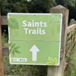 A sign for The Saints Trails, a hiking route from Perranporth to Goonhavern